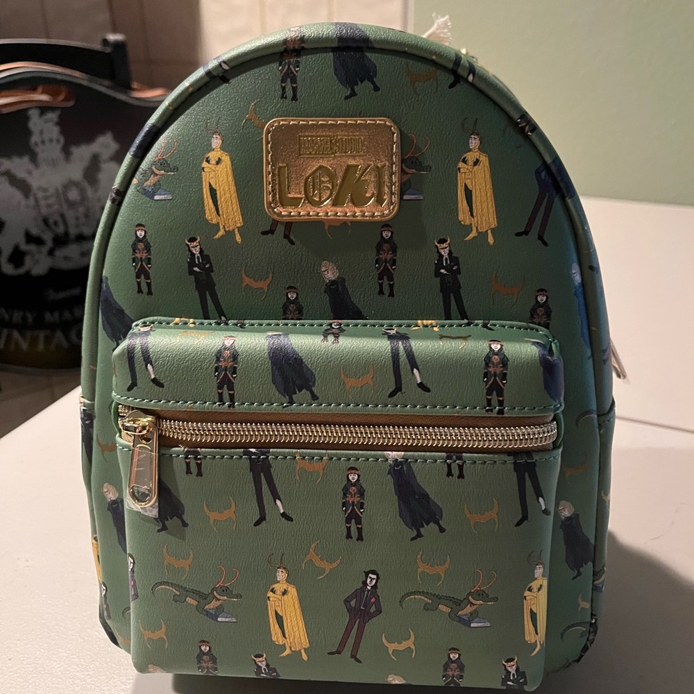 Green Mini Backpack with Loki Print. Marvel studios